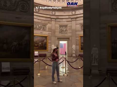 Specialist Madeline Douglas signs Amazing Grace at Capitol Rotunda